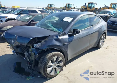 2022 Tesla Model Y Long Range Dual Motor All-Wheel Drive z USA, uszkodzony, nr VIN 7SAYGAEE1NF534290